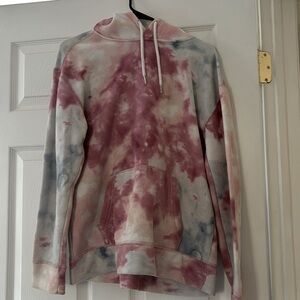 Size small Hollister hoodie. Good condition. Pink, Blue and white.